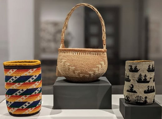 Three patterned, woven baskets